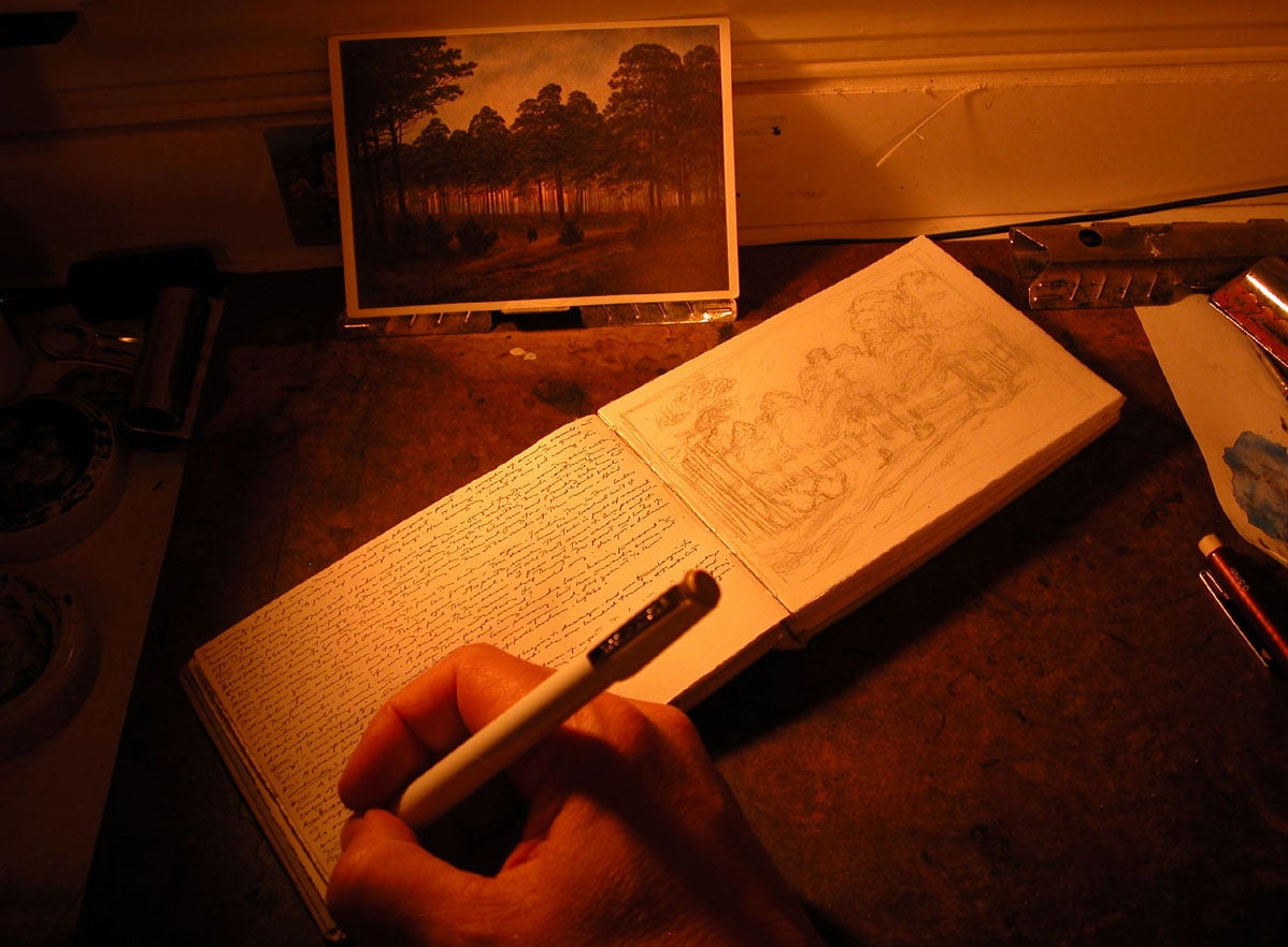 Photograph of the artist working in his journal. See Instagram Artist Feature @JasonHaam. image