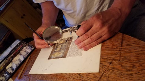 Photograph of the artist at work